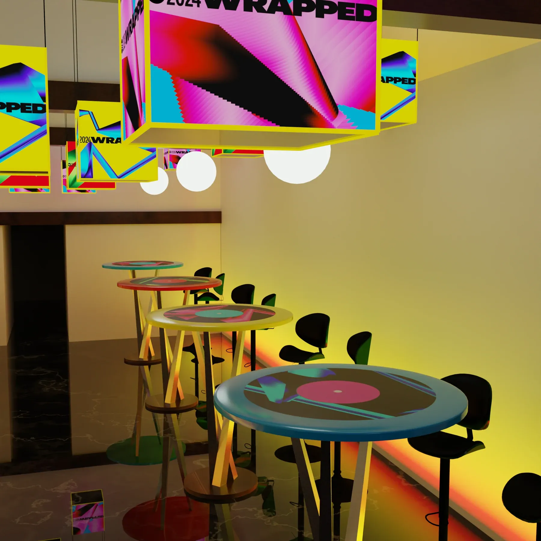 Close view of a record-topped bar table beneath a hanging Wrapped cube.